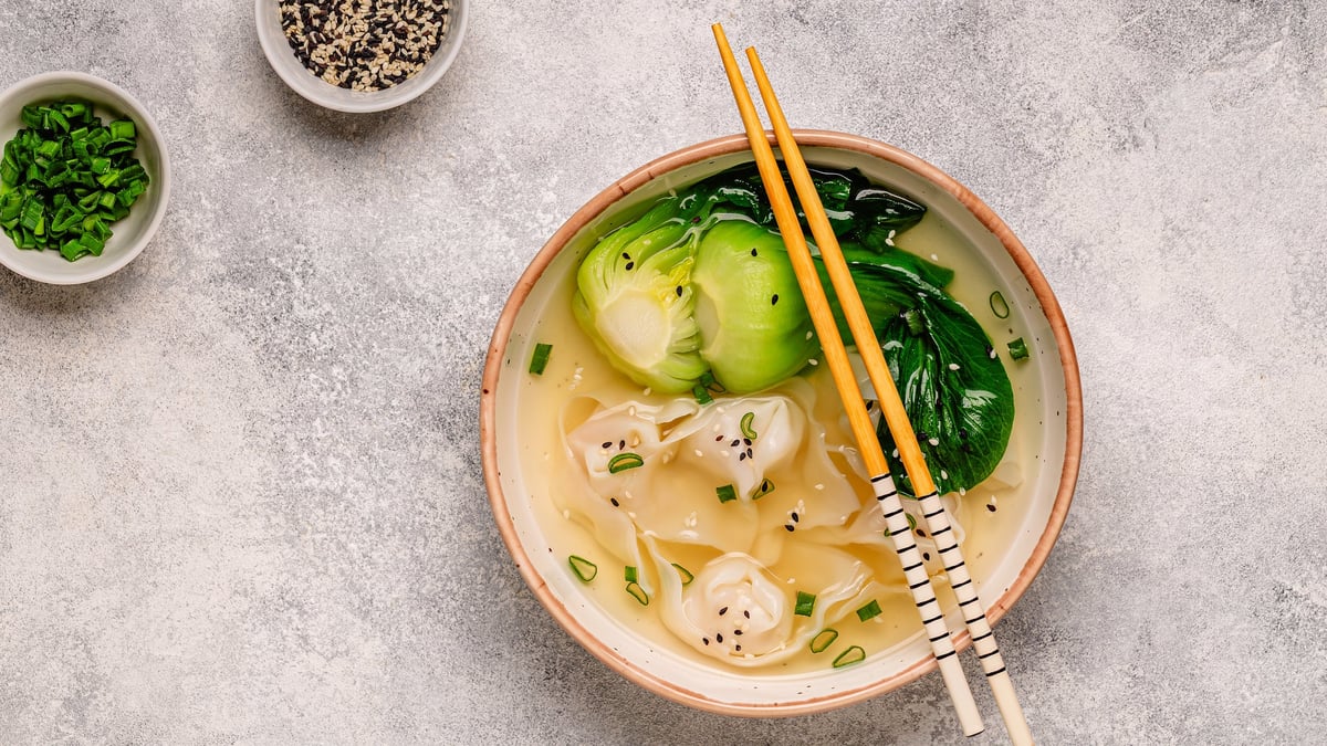 A bowl of soup with greens, a lighter option in the plan